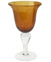 The eye-catching Iris goblet makes a big impact in any setting with a rich amber hue and tiny bubbles trapped in dishwasher-safe glass. From Artland.