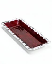 Full of surprises, this handcrafted tray from the Simply Designz collection of serveware and serving dishes pairs sleek, polished aluminum with a fluted edge and lustrous burgundy enamel. Serve a beautiful meal or simply accent the table.