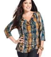 Style&co.'s three-quarter-sleeve plus size top is a perfect addition for your day-to-play wardrobe-- dress it up with trousers or down with denim!