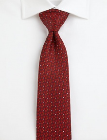 Eye-catching dots flawlessly complement this silk tie.SilkDry cleanMade in Italy