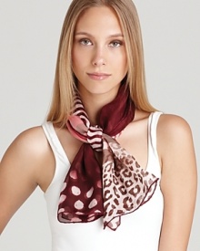 Look fierce in this zebra and cheetah printed scarf from Salvatore Ferragamo.