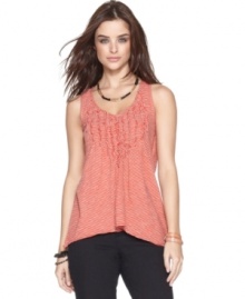 This soft cotton tank top offers laid-back style thanks to a chic A-line silhouette and uneven hem, from DKNY Jeans.