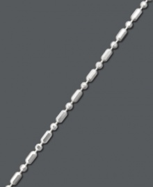 Add special flair to suntanned legs. Giani Bernini's polished anklet features a dot dash design crafted in sterling silver. Approximate length: 9 inches.