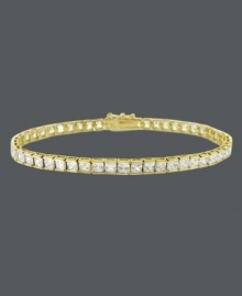 Add an element of luxury to your look with a luminous bracelet. B. Brilliant design features a row of round-cut, channel-set cubic zirconias (10 ct. t.w.) set in 18k gold over sterling silver. Approximate length: 7-1/4 inches.