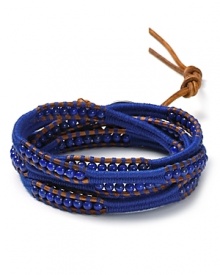 Tie on bohemian style with this woven wrap bracelet from Chan Luu, crafted of leather and lapis beads. Its mix of materials boldly hints at your free spirited side.