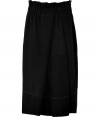 Fabulous black suede long skirt - This super luxe skirt has an on-trend stylish midi-length - Flattering gathered waistband and edgy asymmetrical length - Pair with a tie-neck blouse and knee-high boots for a 1970s-inspired look - Try with a t-shirt, a leather jacket, and ankle booties