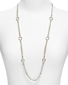 Add a chic accent to your look with this multi-chain necklace with shining stations from Lauren by Ralph Lauren.