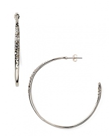 Elegant and understated. Alexis Bittar perfectly easy-chic accessorizing with this pair of rhodium and Swarovski crystal hoop earrings.