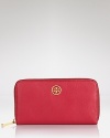 Tory Burch goes continental with this luxe, logo-topped leather wallet.