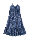 A bohemian-inspired batik print accents the empire-waist maxi dress for effortless summer style.