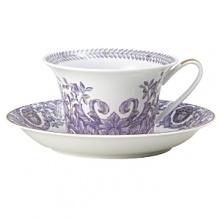 Inspired by the opulent parties of Louis XIV's Royal Court, Versace's Le Grand Divertissement collection is as ornate and luxurious as you'd expect from the Italian design house. The iconic Arabesque leaf design is rendered in lavender and gold against a classic white background with no attention to detail spared.