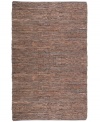 Olé! Spice up your decor with the gorgeously festive style of the Matador rug from St. Croix. Durable leather strips in warm, earthy hues are meticulously hand woven with fine cotton strands, resulting in a beautiful, rustic texture and natural braided pattern that accents even the most eclectic decor.