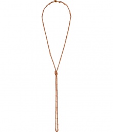 Refined yet on-trend, this chic necklace from cult-favorite Parisian jewelry designer Philippe Audibert brings a stylish accent to any look - Gold-tone chain with small balls and knot detail - Style with a blouse and slim jeans for day and a sleek cocktail dress for evening