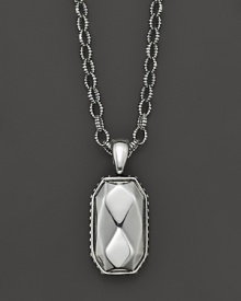 Faceted sterling silver makes a striking statement on a link chain.