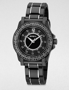 Rows of dramatic black Swarovski crystals and an ultra-light black link bracelet create a timeless contrast of tradition and tech.Quartz movementWater resistant to 10 ATMStainless steel round case with black polycarbonate finish, 35mm diameter (1.38)Crystal bezelBlack dialArabic numeral 12 and crystal hour markersSecond handLightweight black polycarbonate link bracelet with stainless steel accentsImported