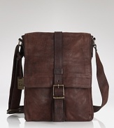 Crafted in soft weathered leather, this smaller messenger bag is perfect for organizing round-town essentials in style.