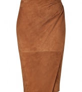 Luxe skirt in sumptuous, supple tobacco suede - A chic classic from American luxury label Ralph Lauren - Feminine and fitted pencil cut creates a flattering silhouette - Elegant wrap style with gathered drape detail - Hits at knee - Slightly higher waist sits comfortably at hips - Zips at back - Versatile and sophisticated, seamlessly transitions from day to evening - Pair with a button down or a silk blouse and platform pumps or sandals