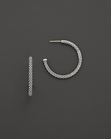 Signature sterling silver Caviar™ beaded earrings, designed by Lagos.