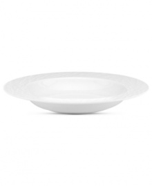 Set the tone with the white bone china of Devore dinnerware. A matte, organic texture lends chic distinction to a rim soup bowl that's equally suited for fine dinner parties and every day of the week. From Donna Karan by Lenox.