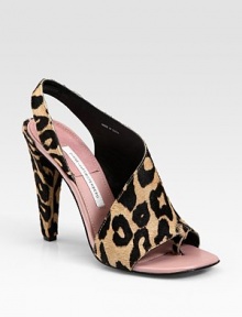 Classic leopard-print calf hair in an asymmetrical design with a high heel and toe ring. Calf hair-covered heel, 4½ (115mm)Leopard-print calf hair upperLeather lining and solePadded insoleImported