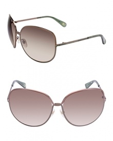 Add a funky element to any ensemble with DIANE von FURSTENBERG's twisted metal frame sunglasses.