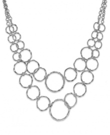 Add a captivating look to your attire with this circle link necklace from Sequin. Crafted in silver tone mixed metal. Approximate length: 15 inches + 3-inch extender. Approximate drop: 3 inches.