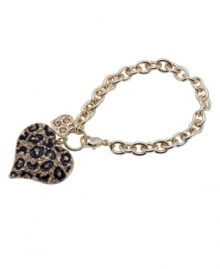 Perfect for prowling. This fierce style from GUESS features a leopard print heart in black enamel and crystal. Setting and cable chain crafted in gold tone mixed metal. Approximate length: 7-1/2 inches.