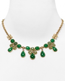 Clustered with jade, aventurine, and crystal stones, Carolee Lux's plated frontal necklace is a bold take on the floral motif.