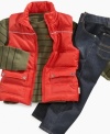 If he likes to get wild, this Calvin Klein Jeans puffer vest adds a bright color and extra storage for adventure, while the jeans and thermal add some extra comfort for the road.