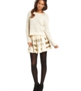 Textural tiers and high-shine sequined panels make this Free People A-line skirt a standout pick for hot winter style!