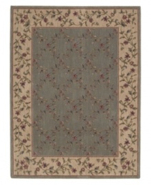 Choose floral and your floor will be sprouting with life. This elegant rug features a gentle palette with a latticework of blossoming vines allover. Bearing the rich patina of premium-quality Opulon™ yarns, each rug boasts a densely woven and strikingly luxurious pile that's a pleasure to touch and admire. One-year warranty.