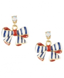 Pander to your preppie side. Betsey Johnson's adorable bow drop earrings features a round-cut crystal post with blue, white, and red enamel accents. Crafted in antique gold-plated mixed metal. Approximate drop: 1-1/4 inches.