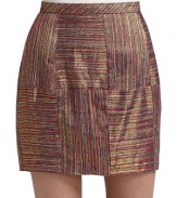 This eclectic look woven from colorful metallic yarns, adds vibrant fun to your day to night repertoire.Banded waist Seamed panels Exposed zipper at the back About 17 long Fully lined Polyester; dry clean Imported