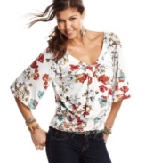 From the floral print to the wide sleeve construction, kimono inspiration abounds on this top from American Rag!