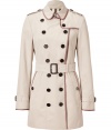 With heritage detailing reflecting the original Burberry trench coat, this tonal piped cotton version from Burberry London counts as a sophisticated, multi-season investment - Rounded collar with hook closure, set-in long sleeves with belted cuffs, epaulettes, gun flap, double-breasted button-down front, belted waist, rain shield - Fitted silhouette - Pair with slim trousers or jeans and a cashmere pullover