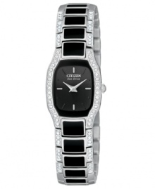 Dress your wrist in divine luster with this boldly contrasting watch from Citizen.