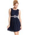 A rosette-adorned waistband creates the perfect finish to this pretty lace dress from BCX!