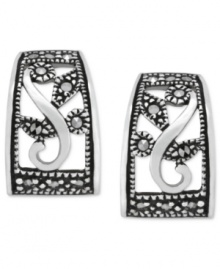 A beautiful pattern develops on these J-shaped hoop earrings from Genevieve & Grace. Set in sterling silver, the pair features a filigree design with marcasite for a visually appealing look. Approximate size: 5/8 by 7/8 inch.