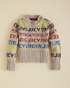 New York, Paris, Juicy, London, Tokyo are printed allover Juicy Couture's chunky sweater to create a modern fairisle effect.