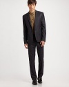 A new standard in dressing is cut with slim, modern lines in premier wool. Pair it with the Donnie Suiting Pants, chinos or even jeans. Two-button closureChest welt, waist flap pocketsRear double flapsFully linedWoolDry cleanImported