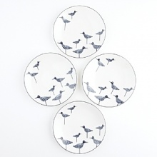 The perfect complement to the nautical-themed kate spade new york Wickford collection, these shorebirds are sure to add a dash of whimsy to your table in a set of four tidbit plates.