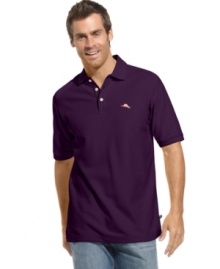 Casual wear meets high technology. This polo shirt from Tommy Bahama wicks moisture for the ultimate in cool comfort.