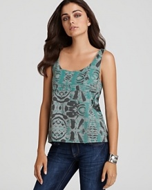 An earthy print lends worldly appeal to this vibrant Hurley tank. And a cutout back reveals a subtle hint of skin.