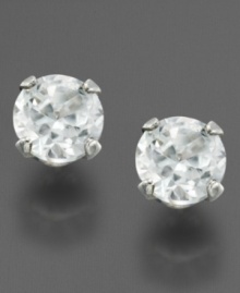 Give her a dose of classic glamor with these faceted cubic zirconia (3mm) stone earrings. In 14k gold.