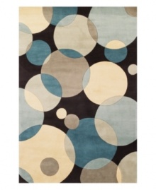 Abstract and absorbing, this rug features a multi-circle pattern in gray, taupe and an array of blues. Reminiscent of modern art paintings, it adds striking modernity and grace to your home. Hand-tufted and hand-carved of plush wool.