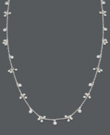 Perfect with a white blouse, even better doubled up with a little black dress. Long necklace by Lauren Ralph Lauren features clusters of silvertone beads. Crafted in mixed metal. Approximate length: 36 inches.