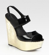 Sky-high self-covered wedge with a glossy patent leather upper and stretchy slingback strap. Self-covered wedge, 5½ (140mm)Covered platform, 2 (50mm)Compares to a 3½ heel (90mm)Patent leather upperLeather lining and solePadded insoleImported