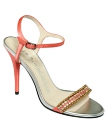 Step out with perfectly-placed rhinestones. Caparros' Aurelia evening sandals put a ladylike finish on your look.