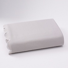 Solid jacquard, 400-thread count fitted sheet with scalloped hem detail.