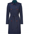 Easy elegance couples with a subtle pop of vibrant color in M Missonis navy trench - Classically slim cut, double-breasted style hits above the knee - Two rows of brown buttons and  waist-cinching wrap belt  - Epaulets, oversize slash pockets, rain flap and small collar with colorful contrast interior lining - Versatile and polished, perfect for pairing with everything from jeans to a cocktail dress